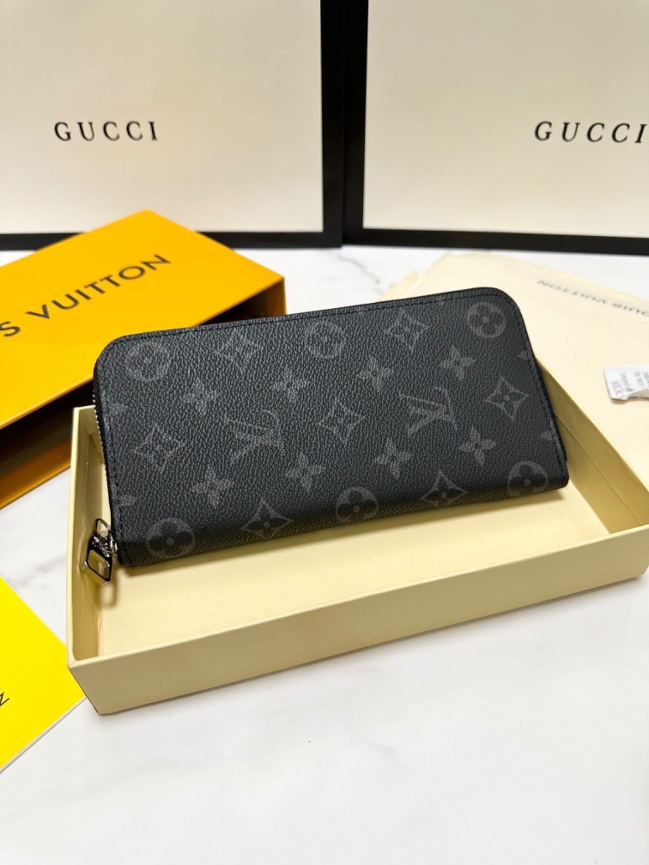 classic monogram long - style zipper wallets, combining exquisite storage with fashion