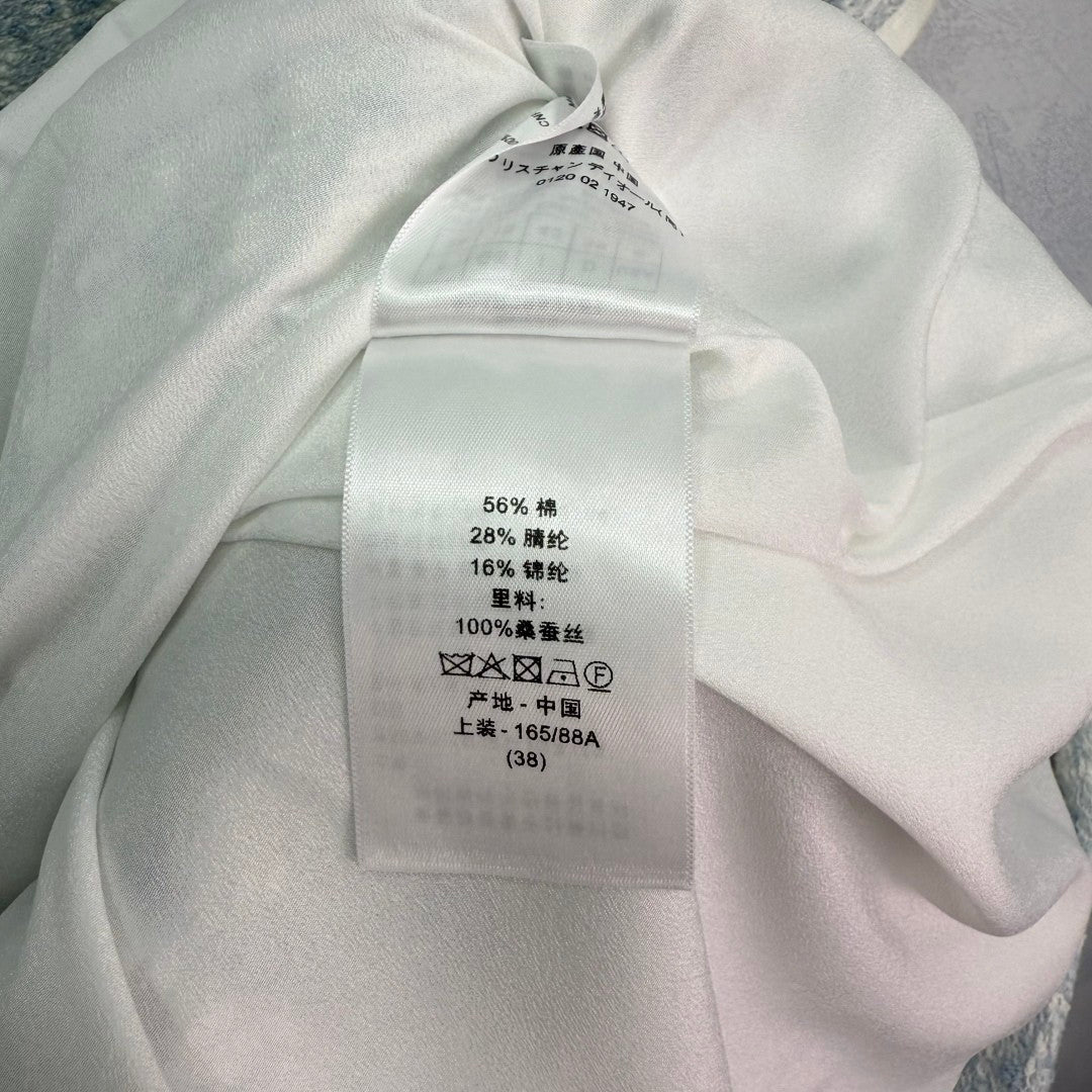 Short - sleeved tweed dress in the style of Chanel