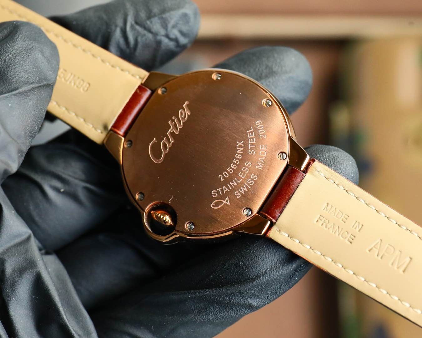 Cartier. Imported quartz movement. Top-grain calfskin leather. Arched blue light glass.