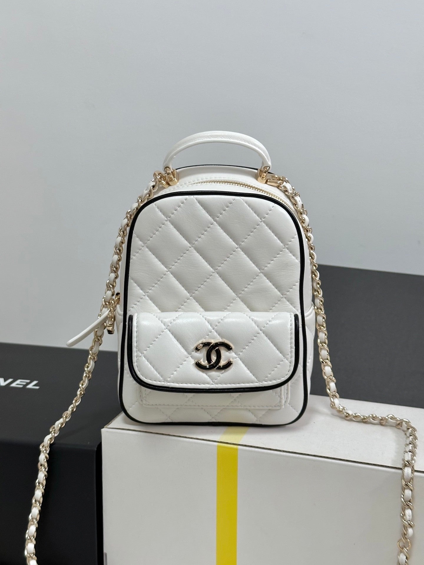 Chic Chanel Quilted White Mini Backpack