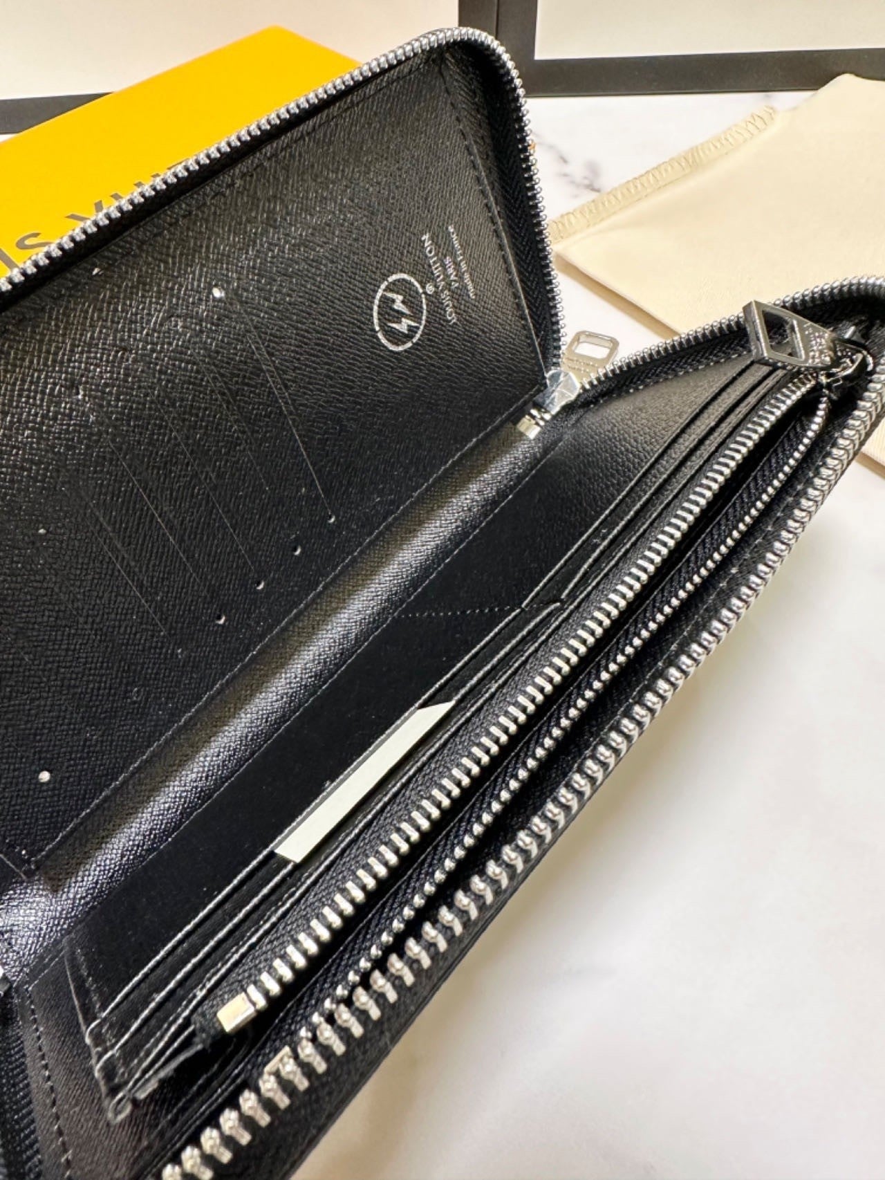 classic monogram long - style zipper wallets, combining exquisite storage with fashion
