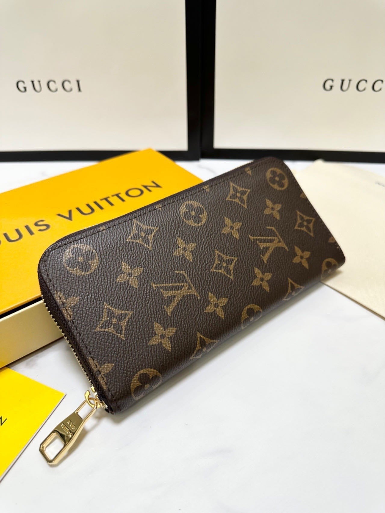 classic monogram long - style zipper wallets, combining exquisite storage with fashion