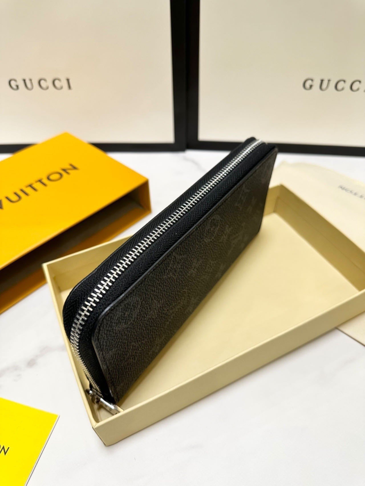 classic monogram long - style zipper wallets, combining exquisite storage with fashion