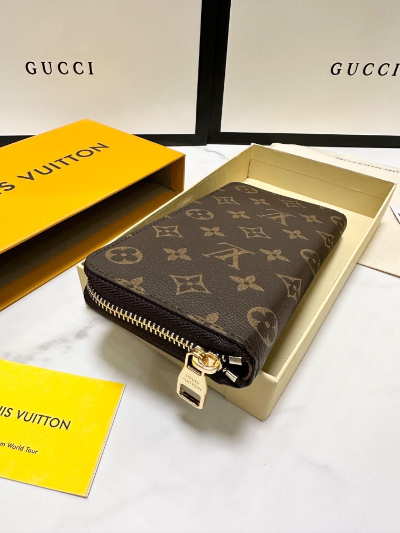 classic monogram long - style zipper wallets, combining exquisite storage with fashion