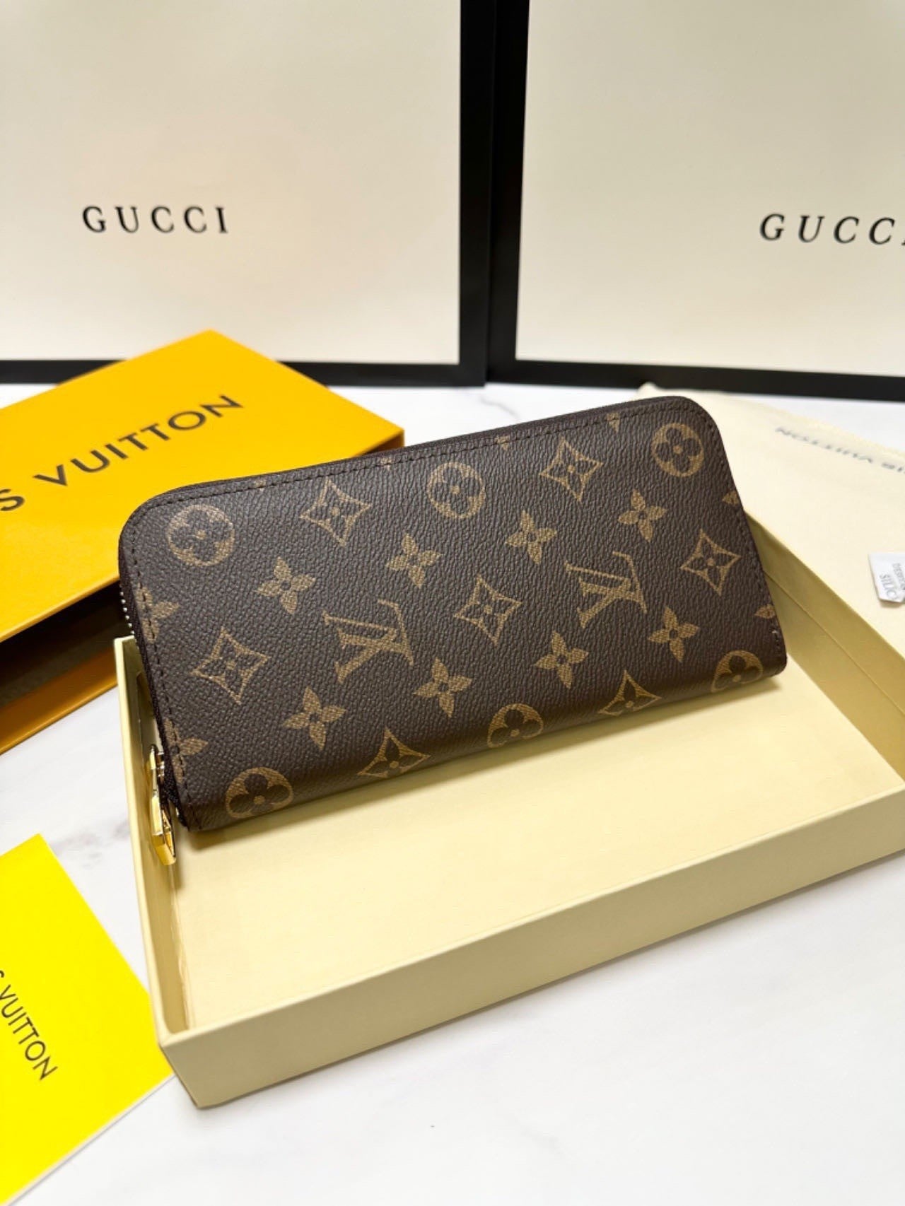 classic monogram long - style zipper wallets, combining exquisite storage with fashion