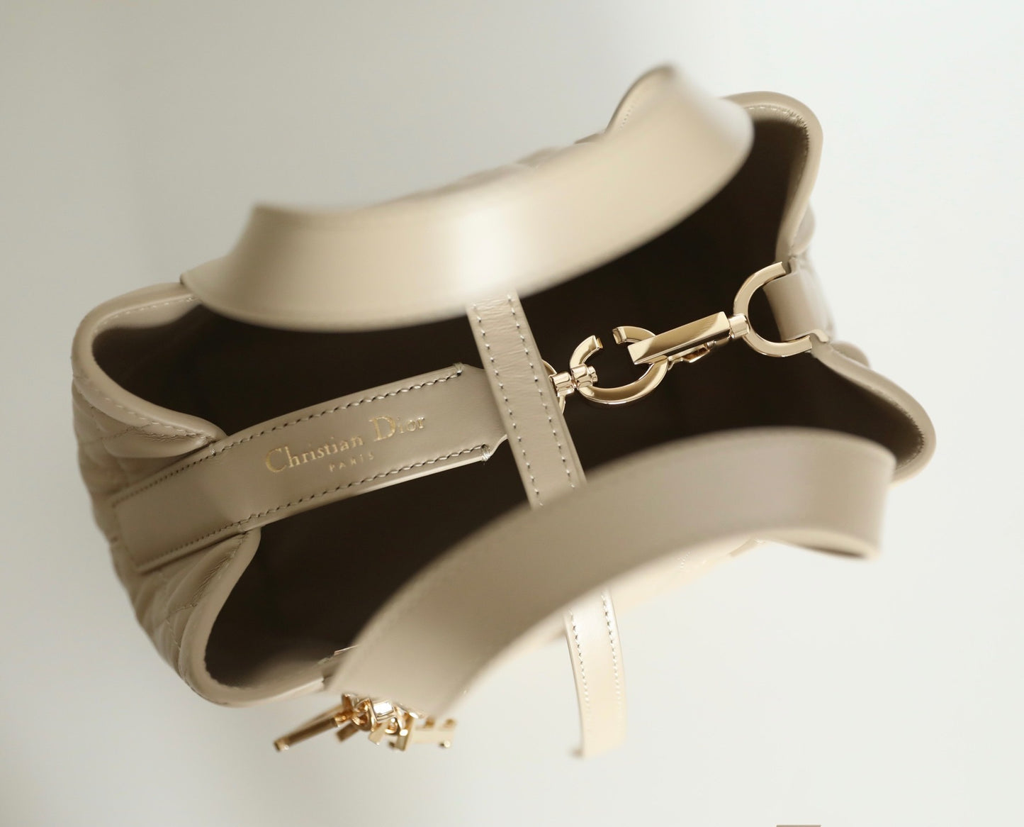 Unveil Luxury with Beige Quilted Handbag