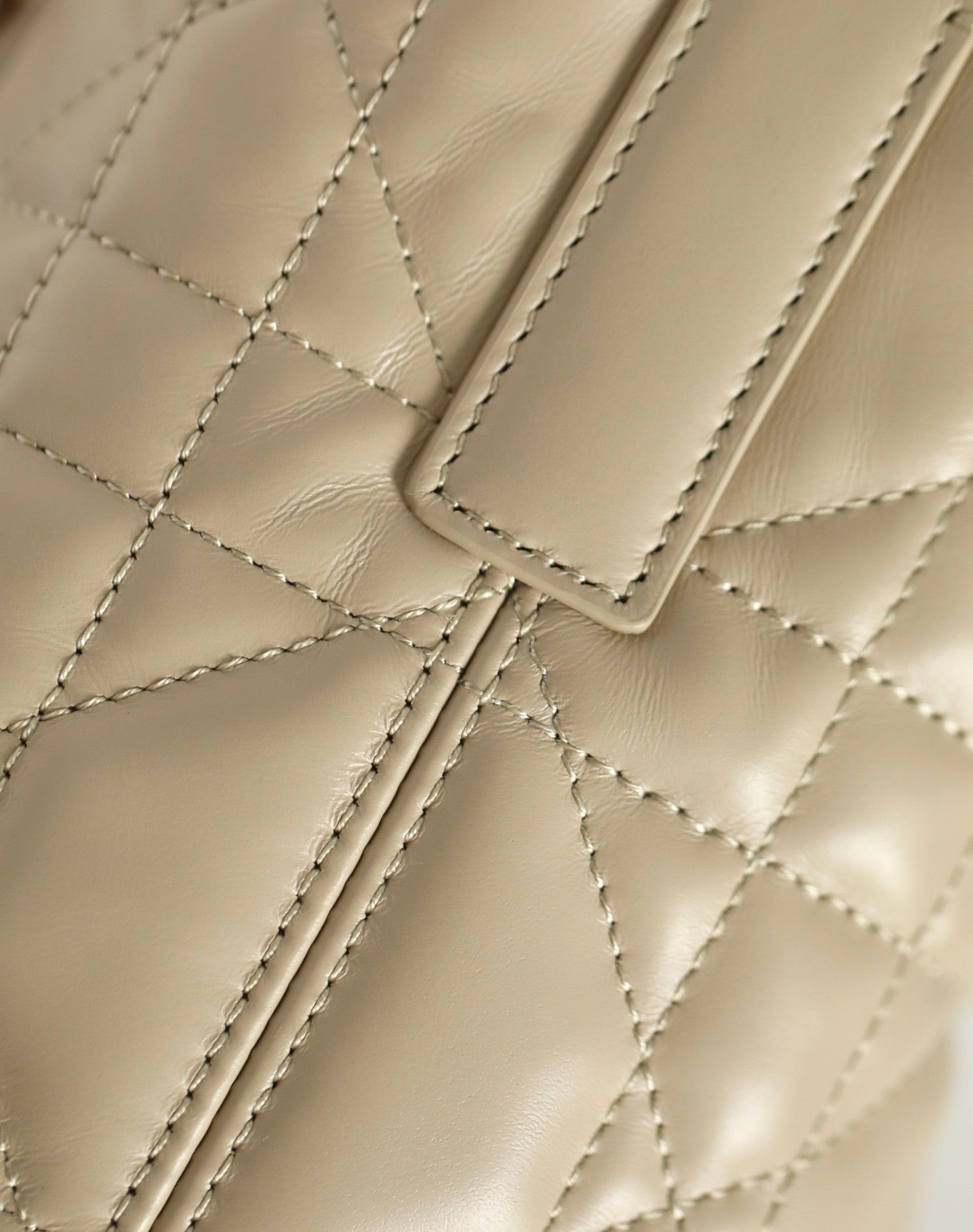 Unveil Luxury with Beige Quilted Handbag