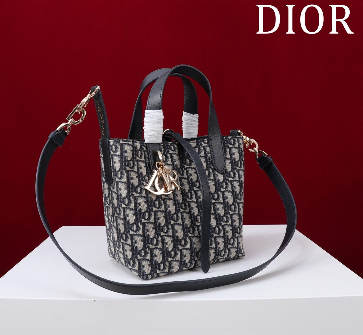 Iconic Revival:  Oblique Print Mini Bucket Bag - Timeless Luxury Redefined