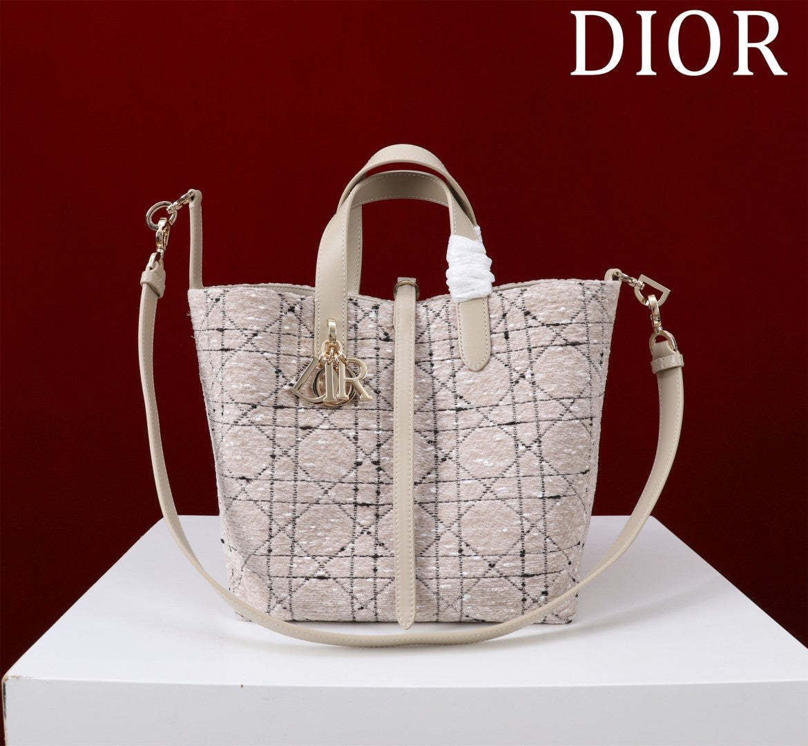 Elegant Allure: Light - Hued Patterned Bucket Bag - A Symphony of Style and Luxury
