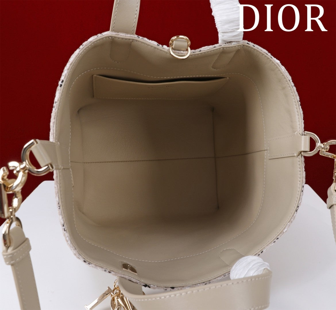 Elegant Allure: Light - Hued Patterned Bucket Bag - A Symphony of Style and Luxury