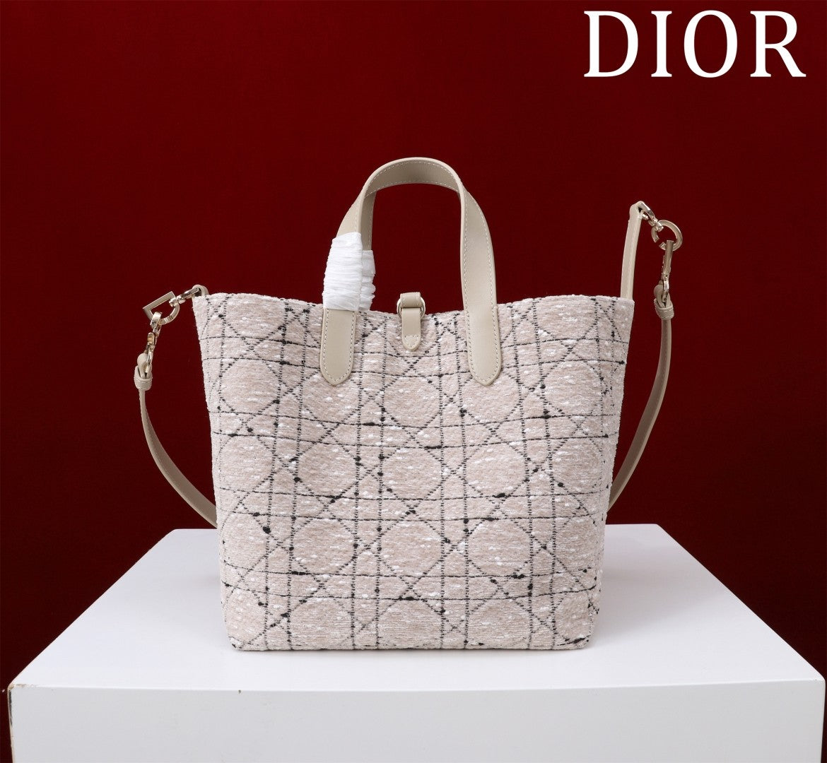 Elegant Allure: Light - Hued Patterned Bucket Bag - A Symphony of Style and Luxury