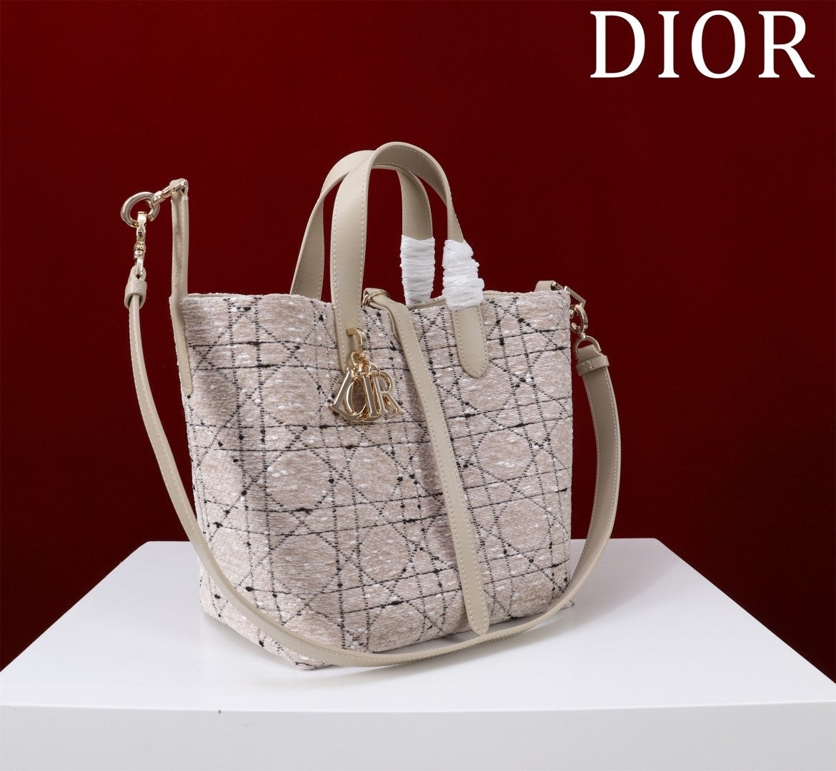 Elegant Allure: Light - Hued Patterned Bucket Bag - A Symphony of Style and Luxury
