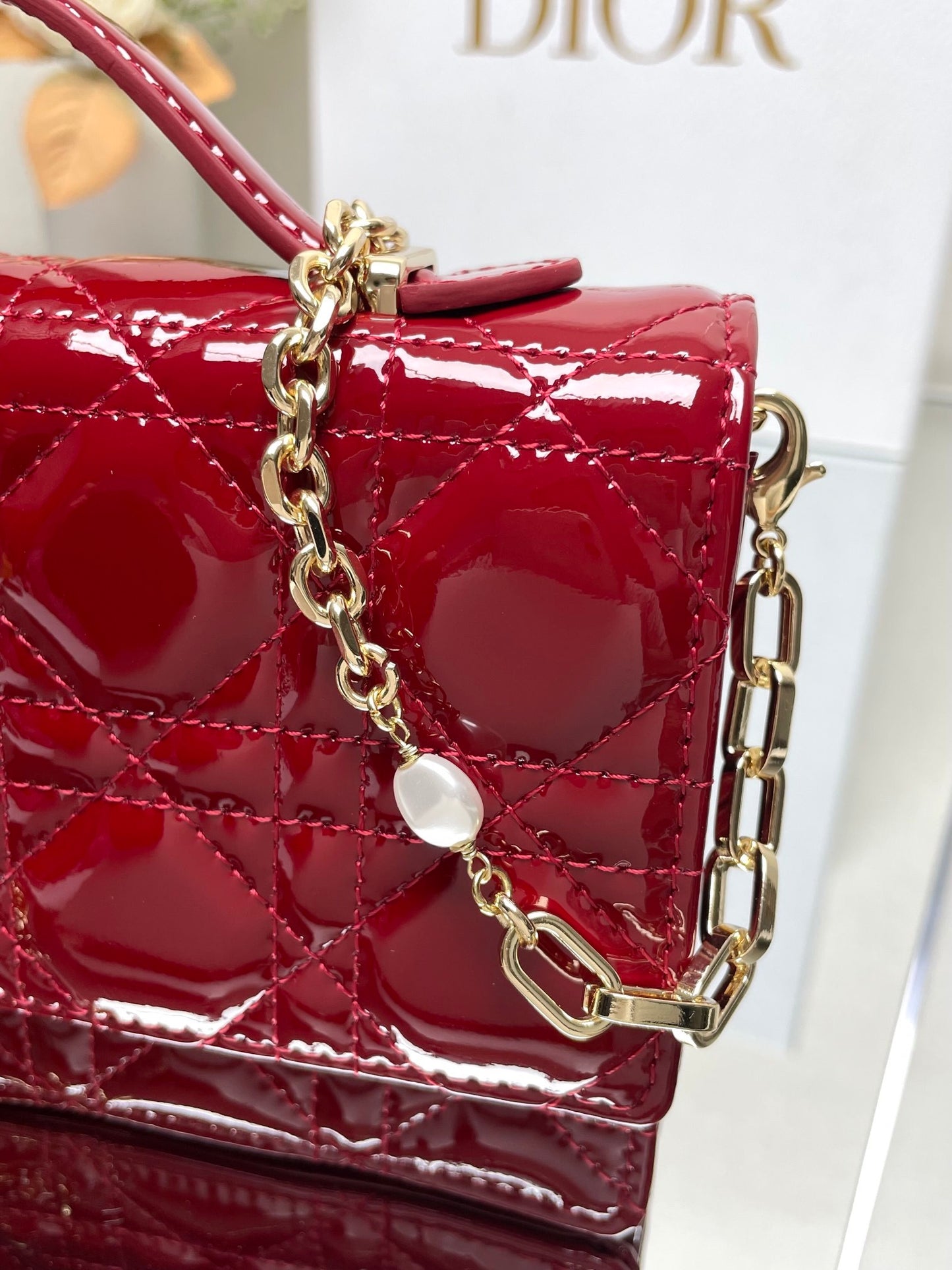 Red Patent Leather Cannage Pattern Pearl Clutch Bag