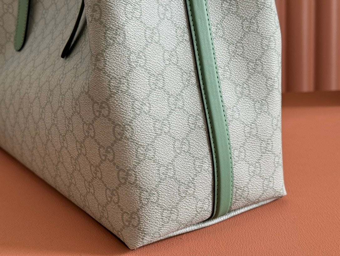 Light green shopping tote bag with GG pattern