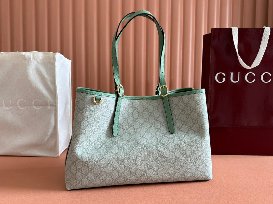 Light green shopping tote bag with GG pattern