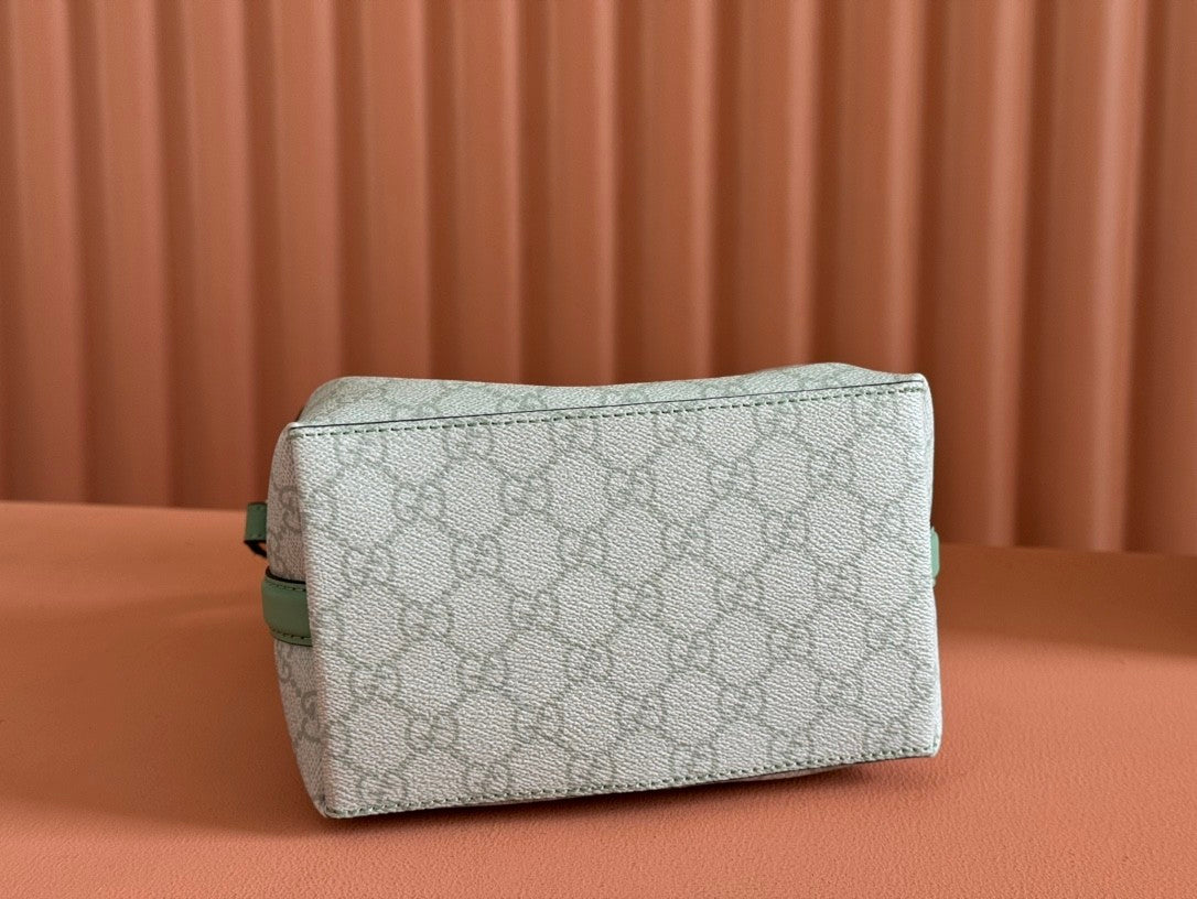 Mini light green bucket handbag with GG pattern