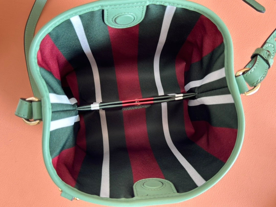 Mini light green bucket handbag with GG pattern
