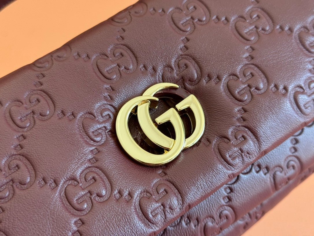 Burgundy leather handbag from the Miliano collection