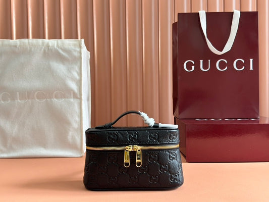 Black embossed handbag