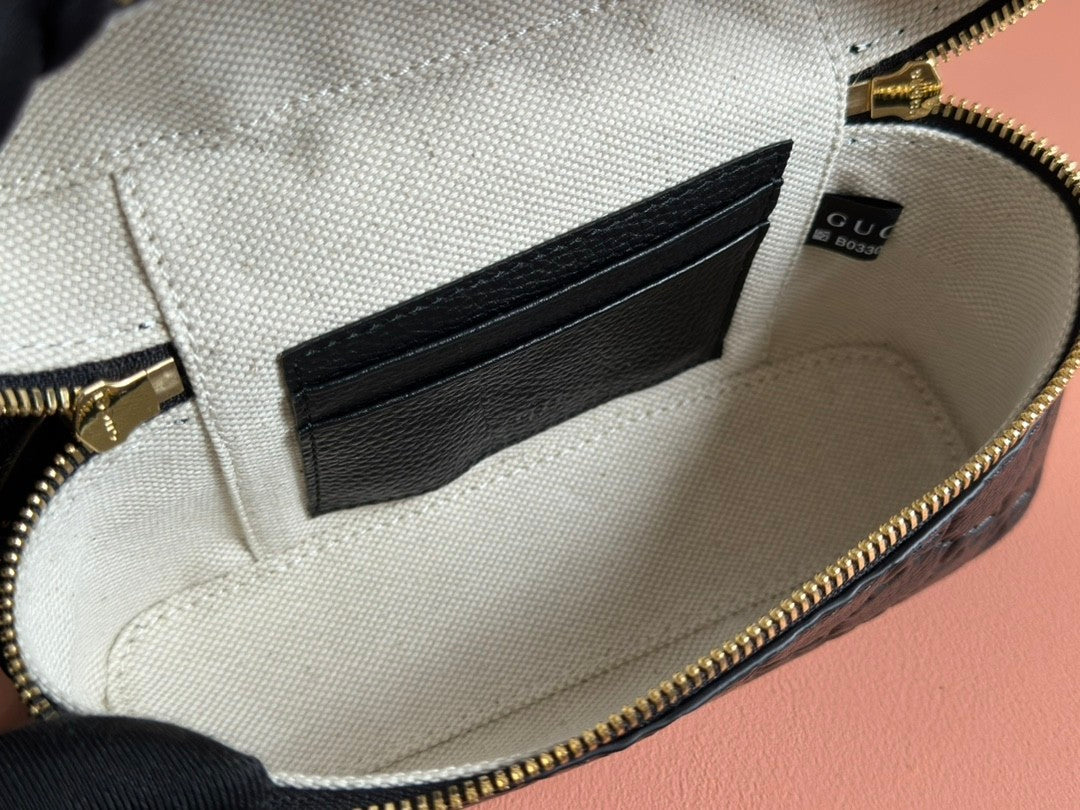 Black embossed handbag