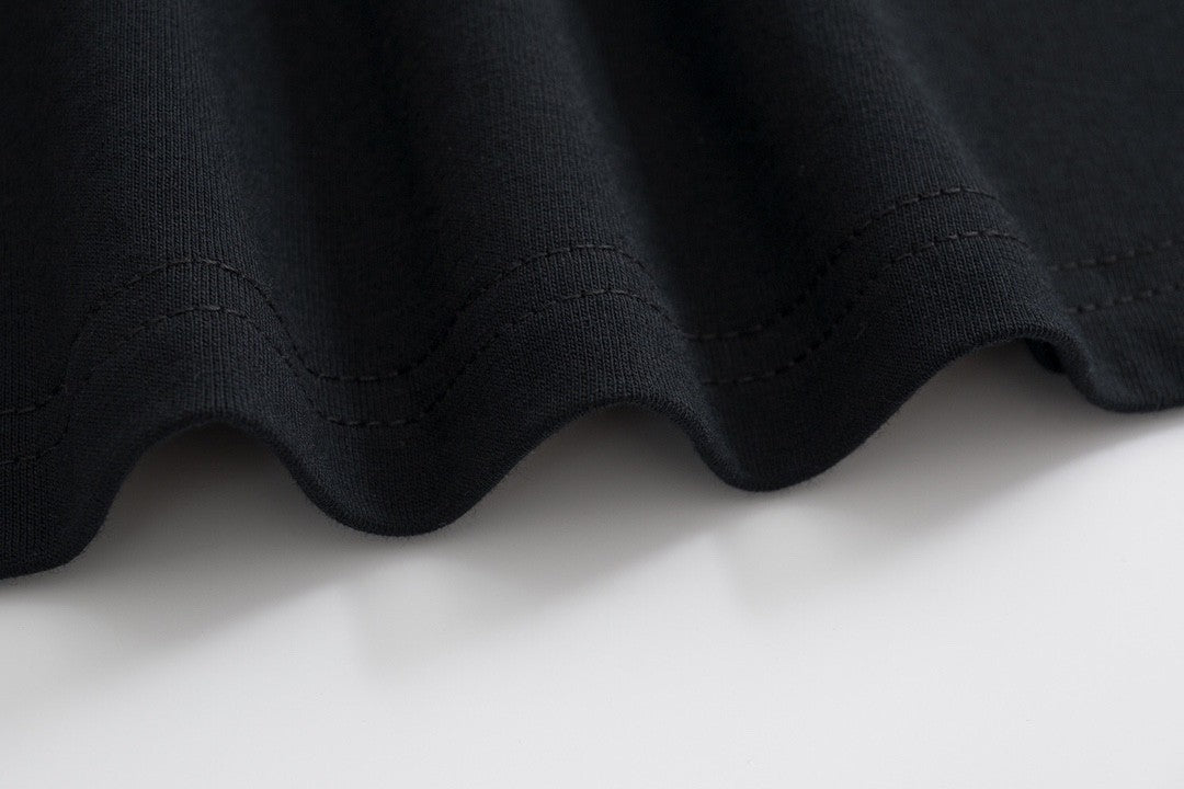 Chic and Quirky:  Inspired Black T - Shirt with Adorable Cartoon Prints