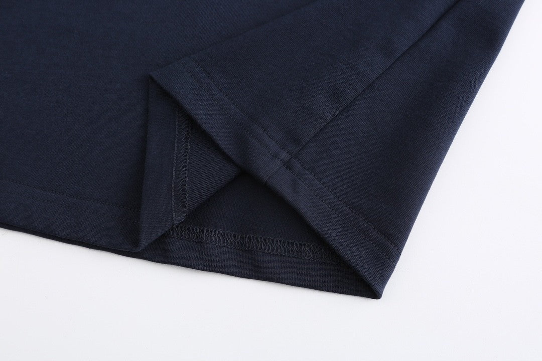 Navy blue T - shirt with an adorable snake and the GG logo. Unisex.