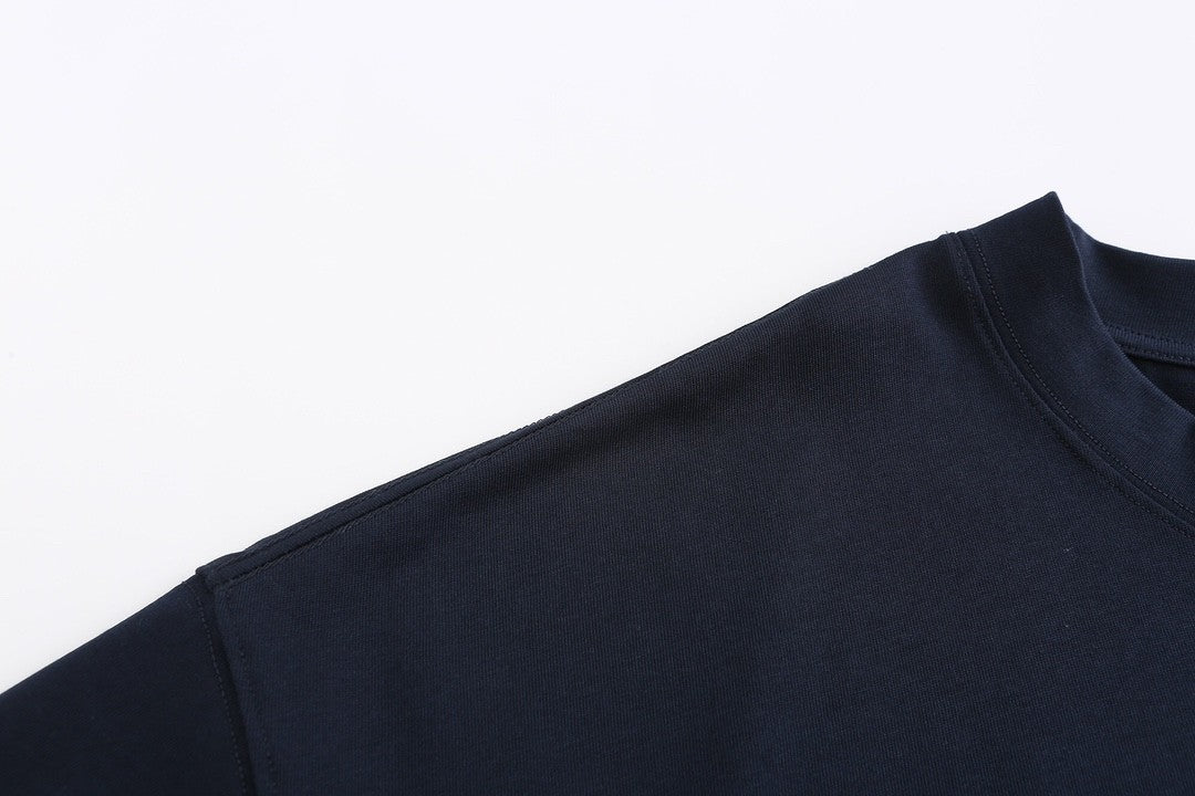 Navy blue T - shirt with an adorable snake and the GG logo. Unisex.