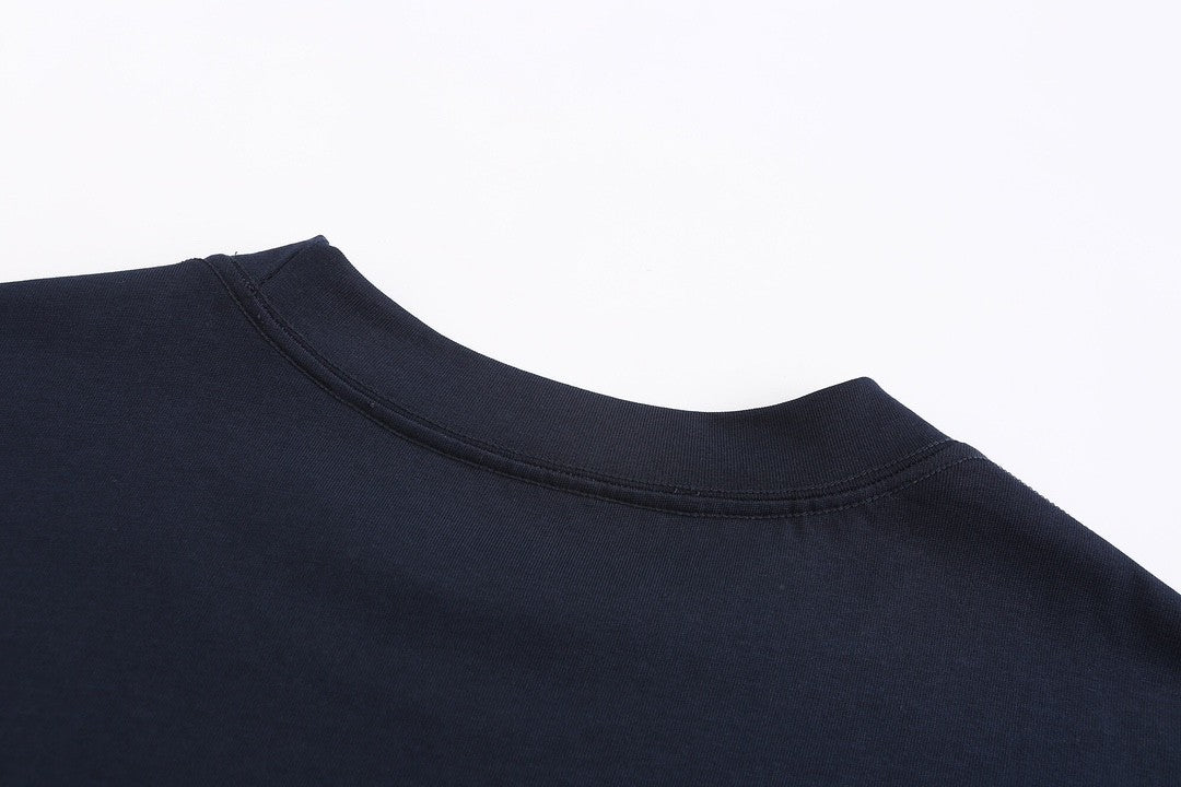 Navy blue T - shirt with an adorable snake and the GG logo. Unisex.