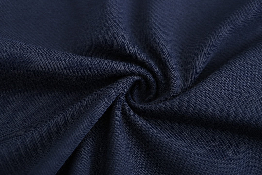 Navy blue T - shirt with an adorable snake and the GG logo. Unisex.