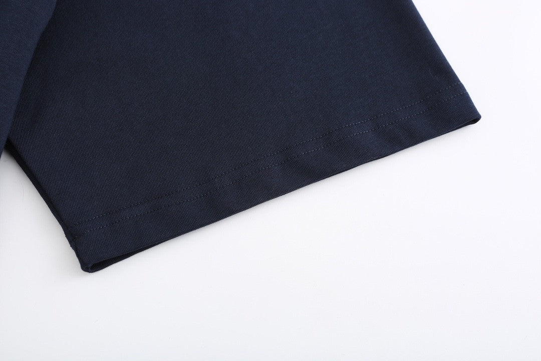 Navy blue T - shirt with an adorable snake and the GG logo. Unisex.