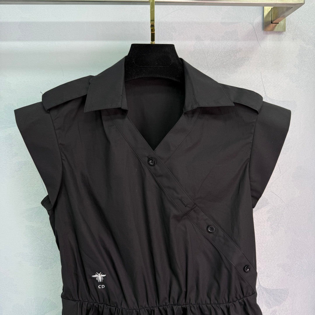 Dress with notched collar, small V - neck, ruffled sleeves and a cinched waist. Made of custom - sourced, pure cotton material.