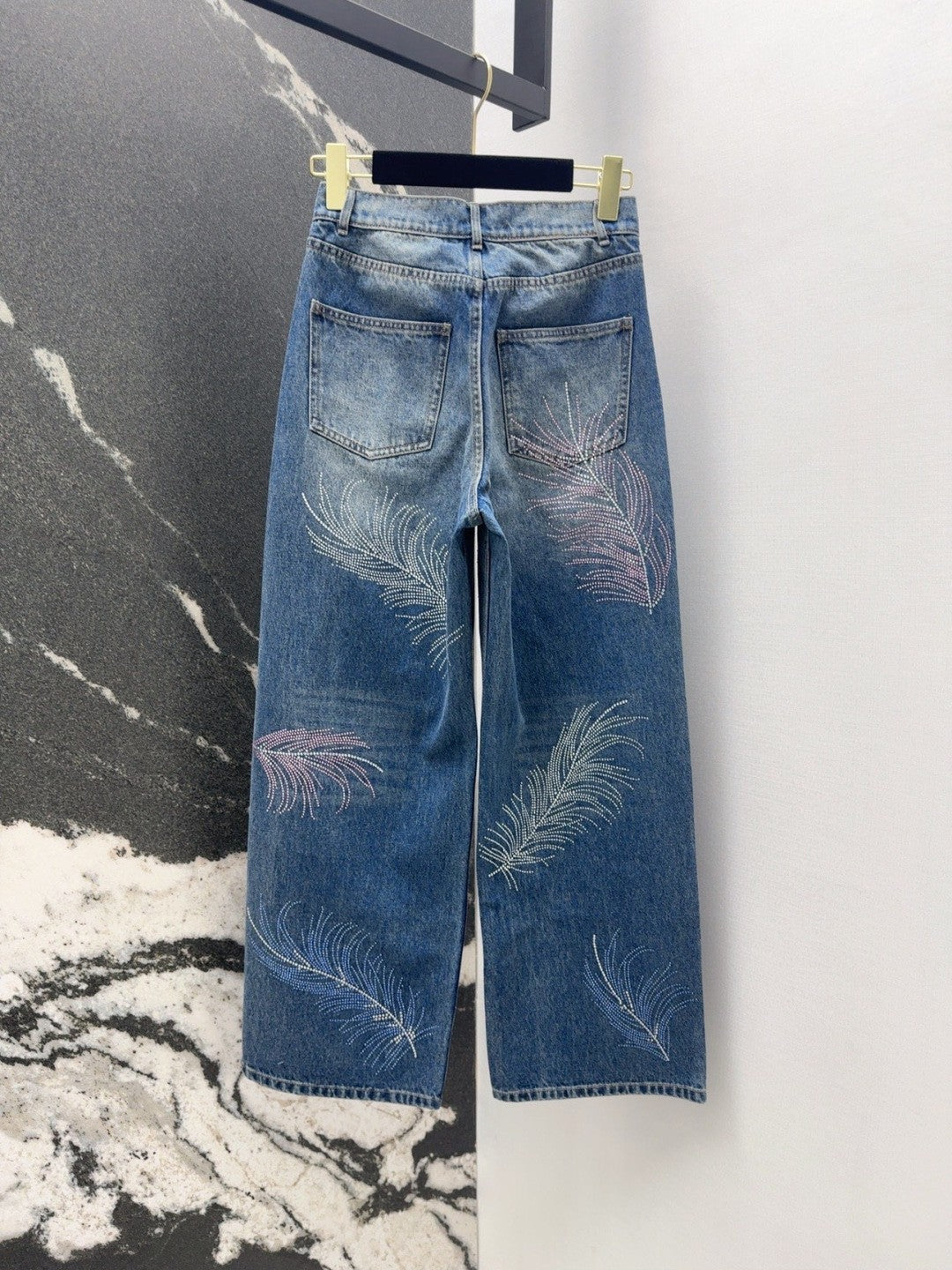 Jeans with Intricate Feather and Rhinestone Embroidery